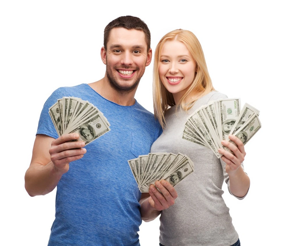 Image of a man and a woman showing off money